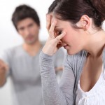 A woman upset, husband emotionally abusing