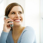 woman-smiling-on-phone