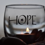 Glass with a hope text on it.