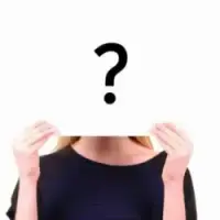 A woman covering her face with a question mark sign.